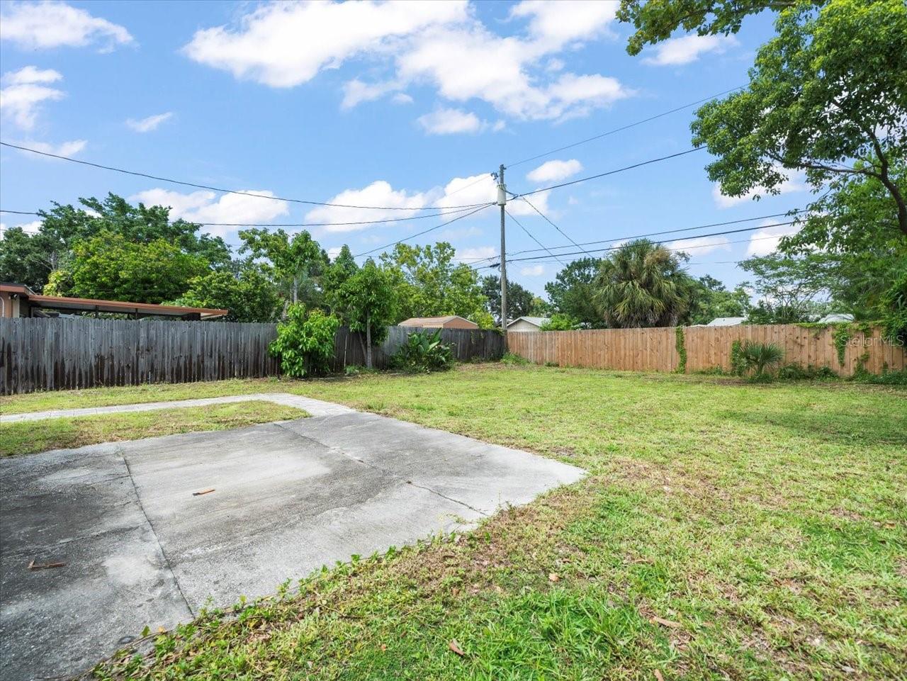 Large fenced yard.