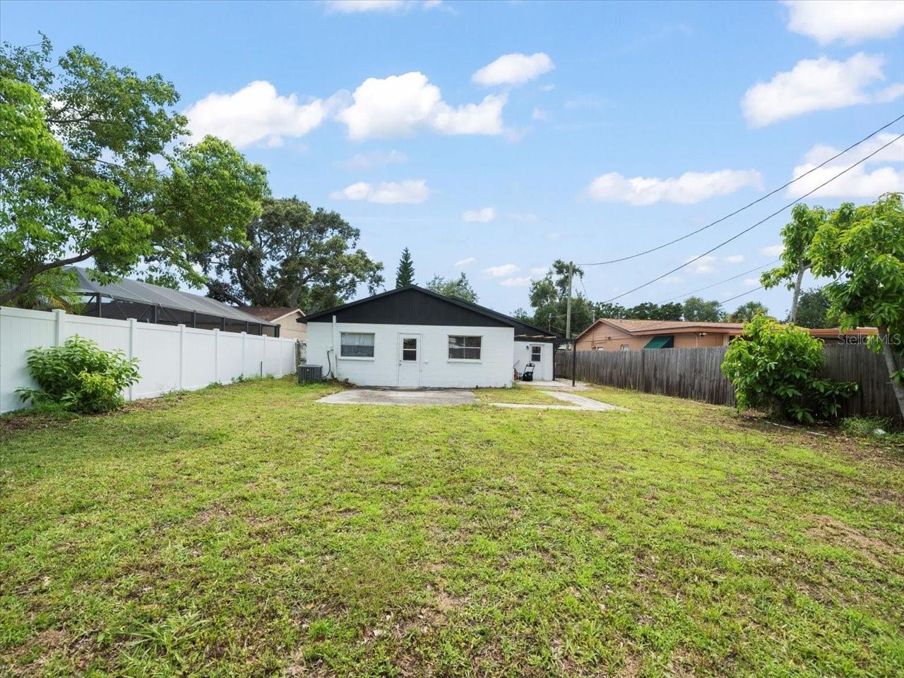 Large fenced yard.