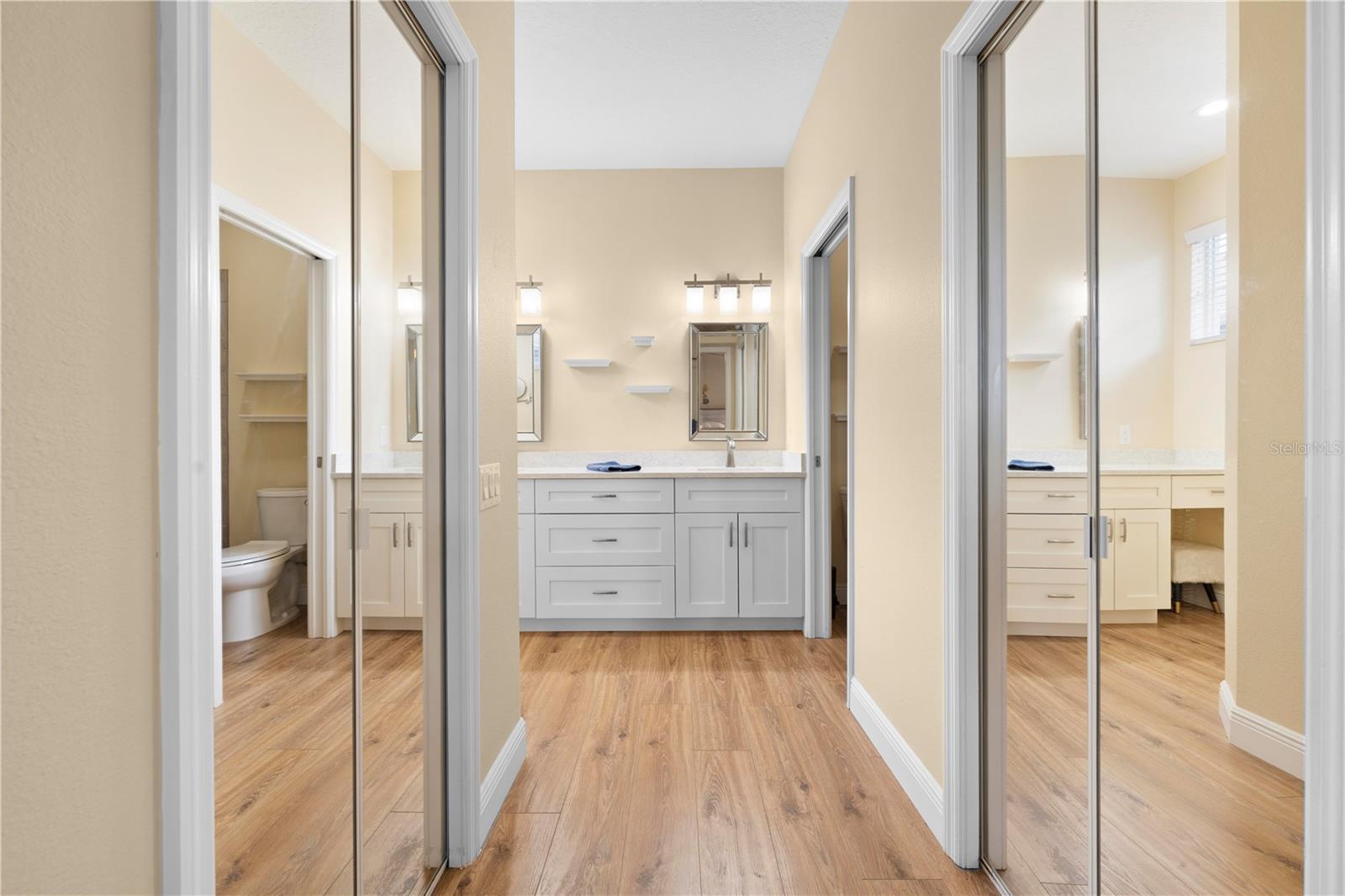 Primary Bathroom & Dual Closets