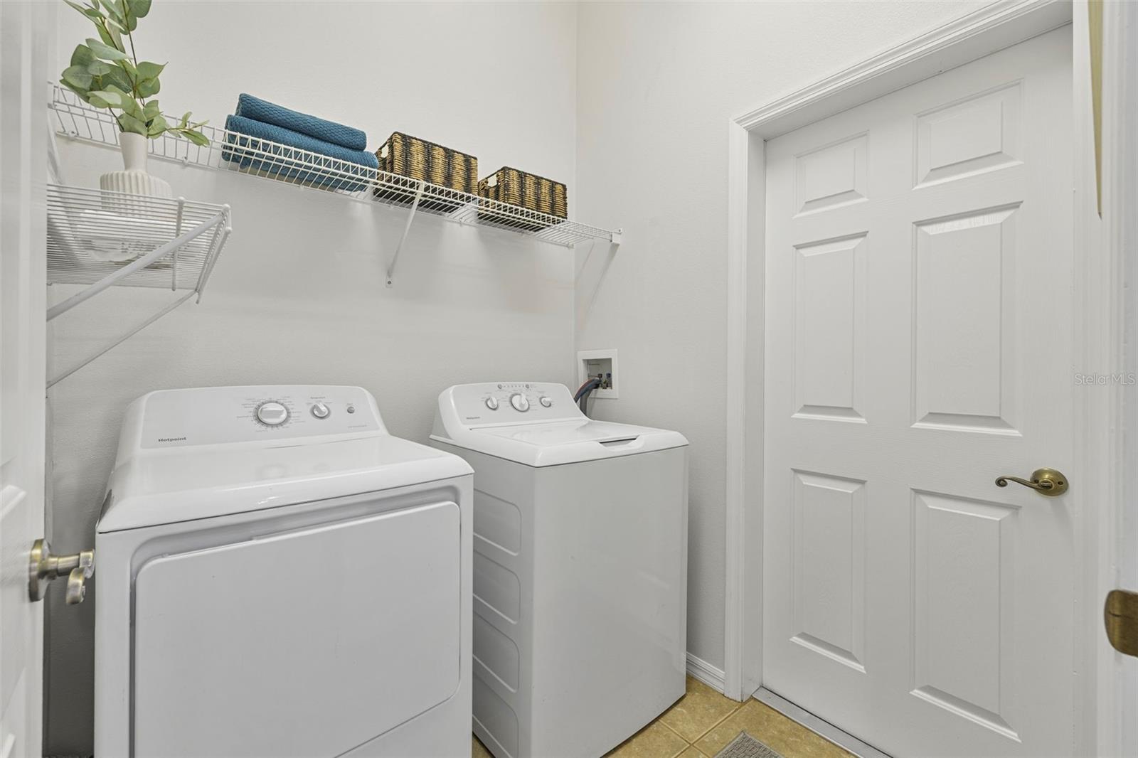 indoor laundry leads to the 2 car garage