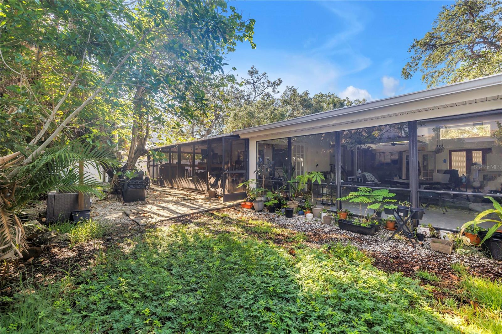 Outside View of Screened in Porch and Dining Areas