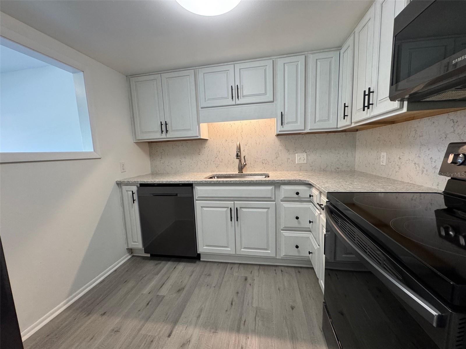Granite Counter Tops, Newer Appliances
