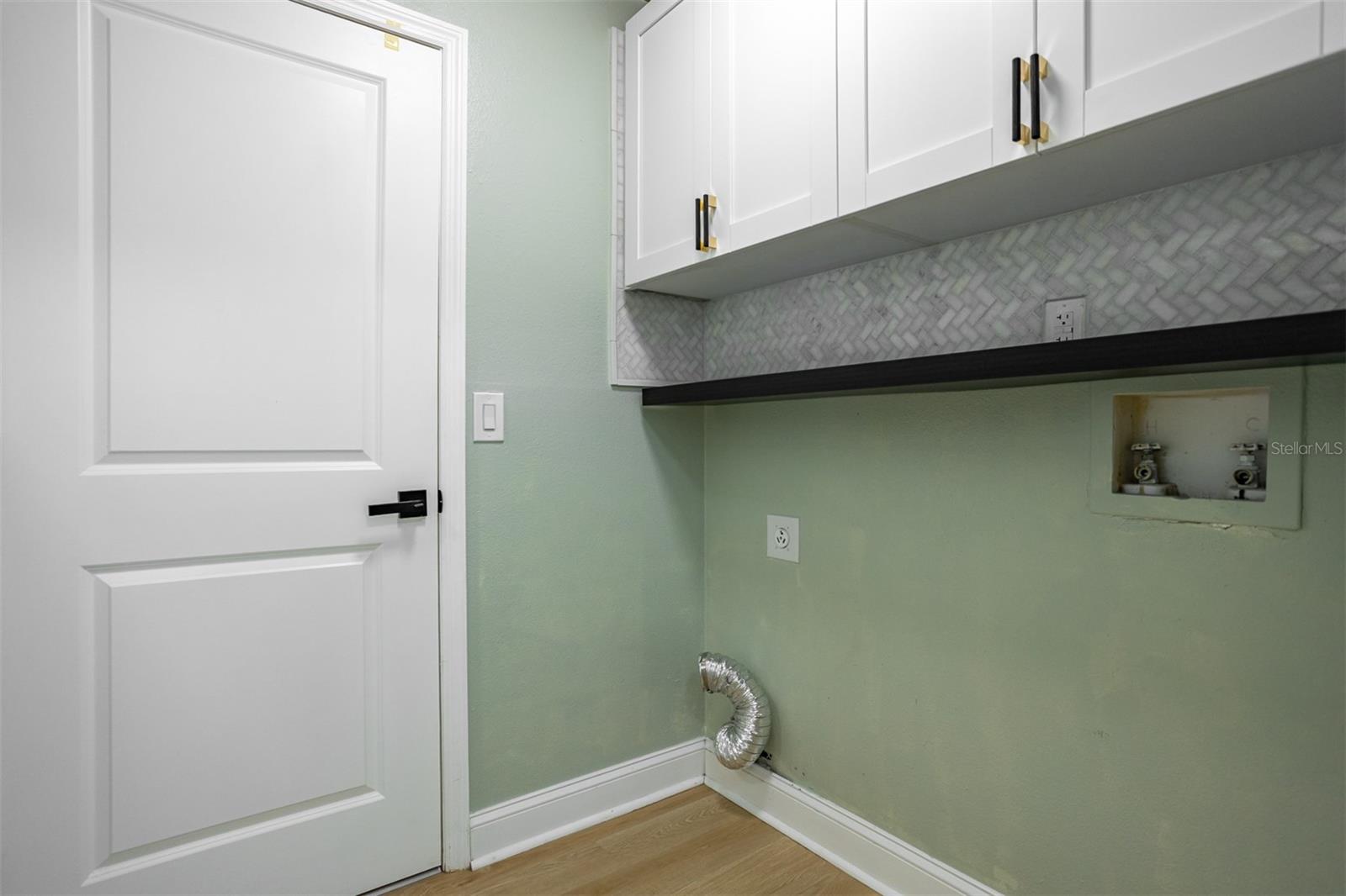 Washer & Dryer room with Upper Cabinet Storage