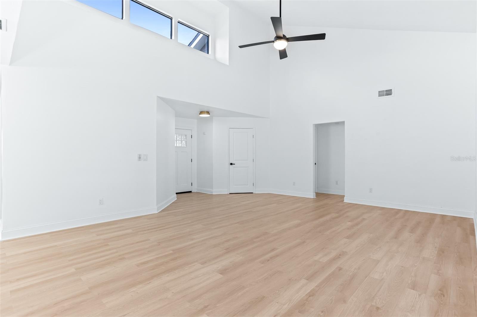 Tall Ceiling with High Windows Providing an Abundance of Natural Light