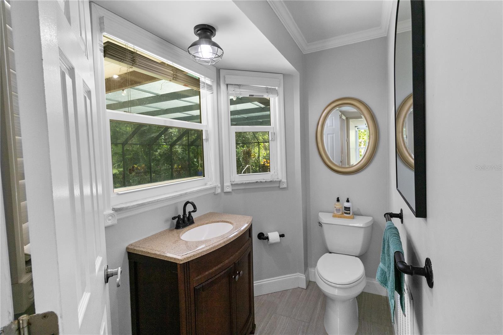 Half Bathroom adjacent to Pool area