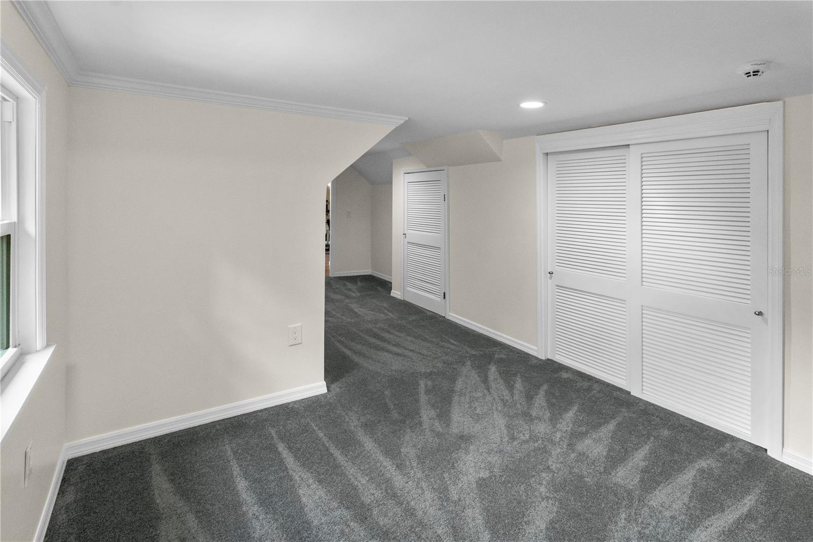 Hallway leading to 4th Bedroom includes Closets for more Storage.
