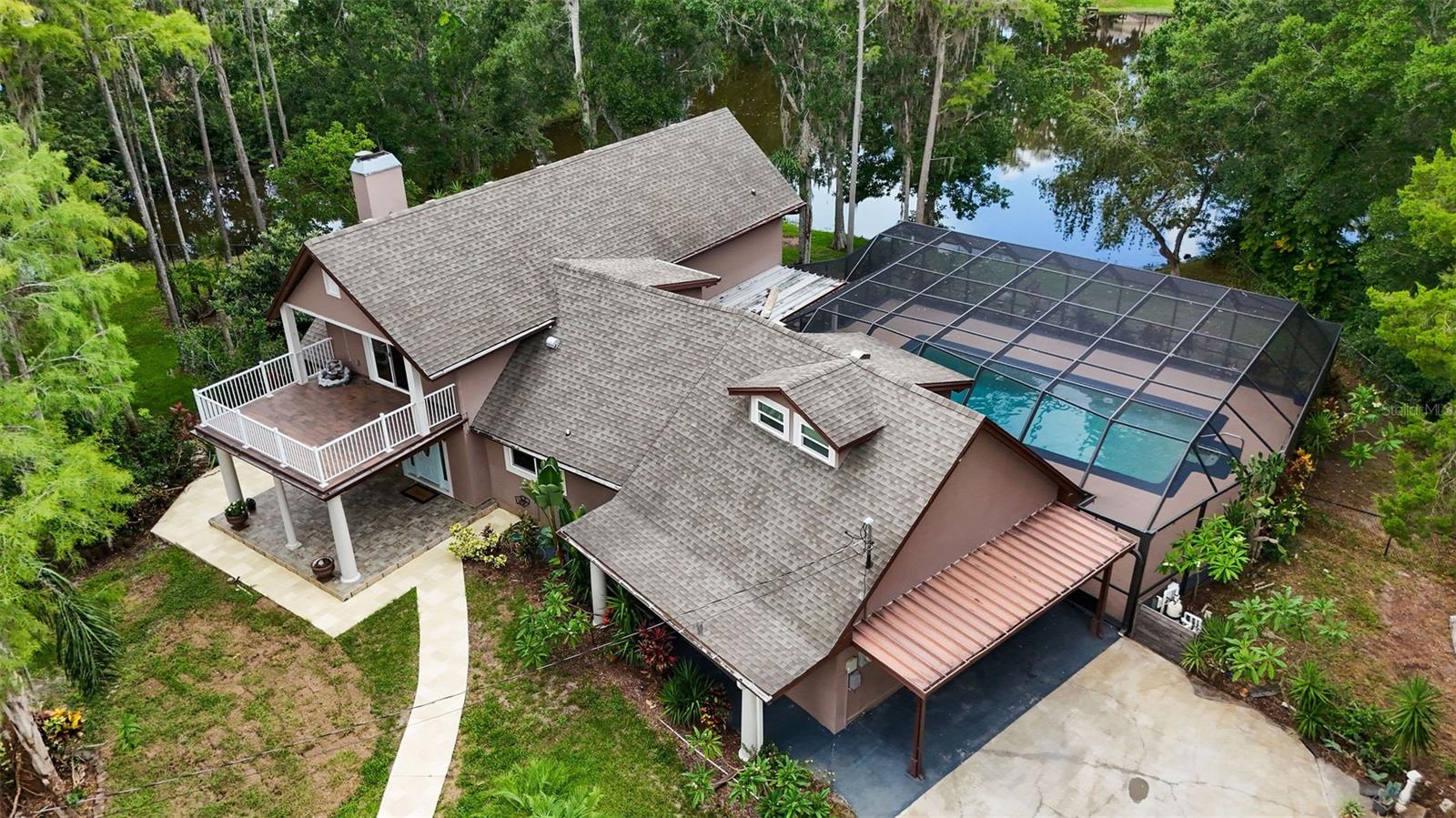 Aerial photography shows the over 2 acre property