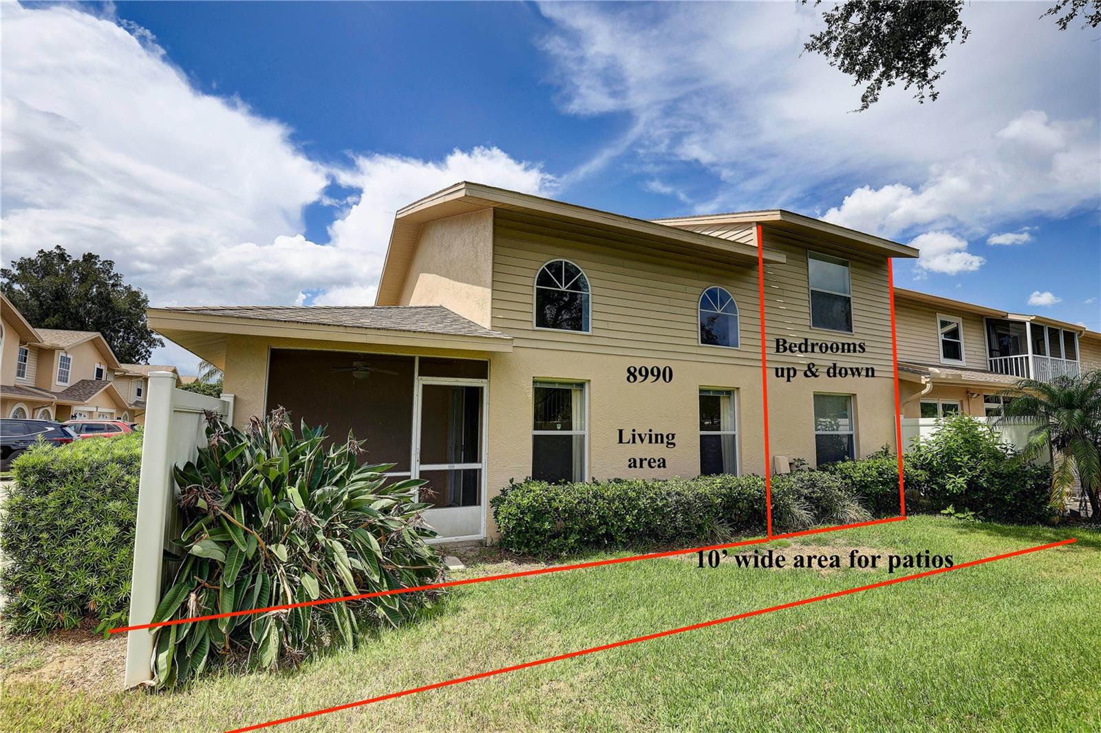Rear view.Unit Owners have 10' out from their unit to enclose the backyard if they wish to do so, or build a deck etc, Plans subject to association approval. Property ends at white fence