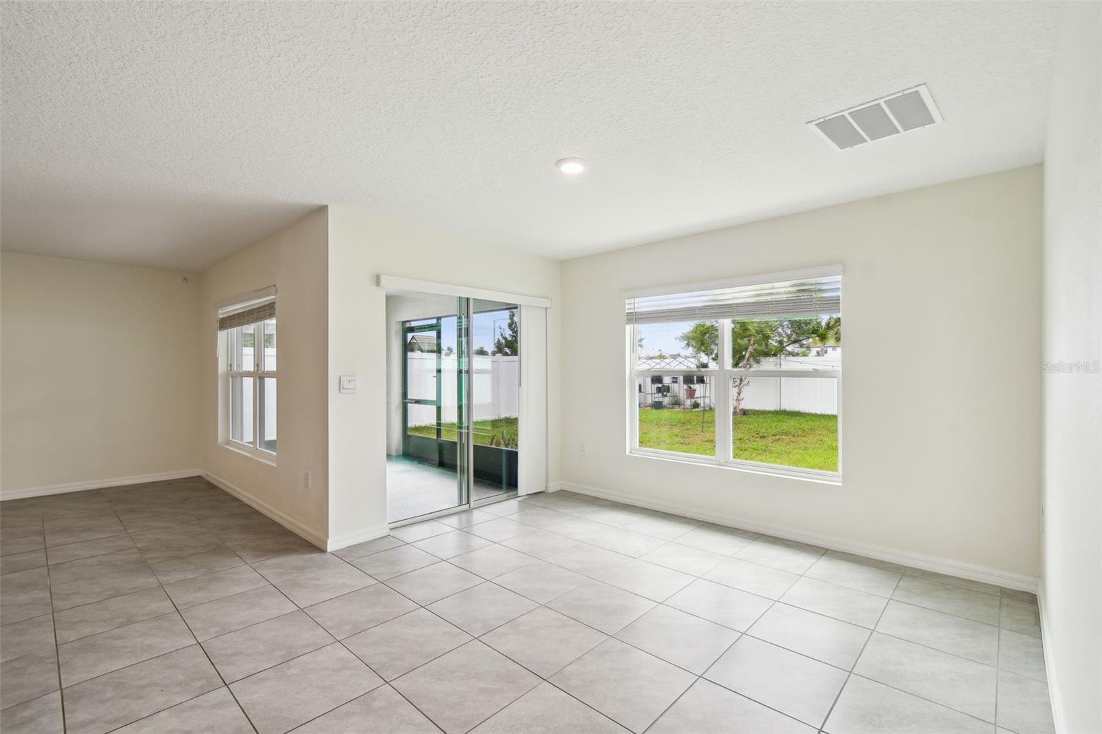 Easy access to your screened in lanai and back yard!