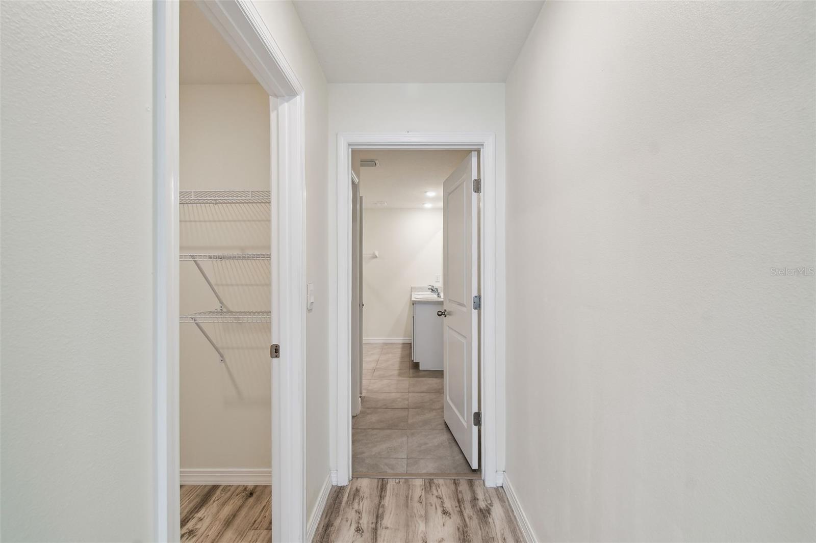 First Walk-in closet on left