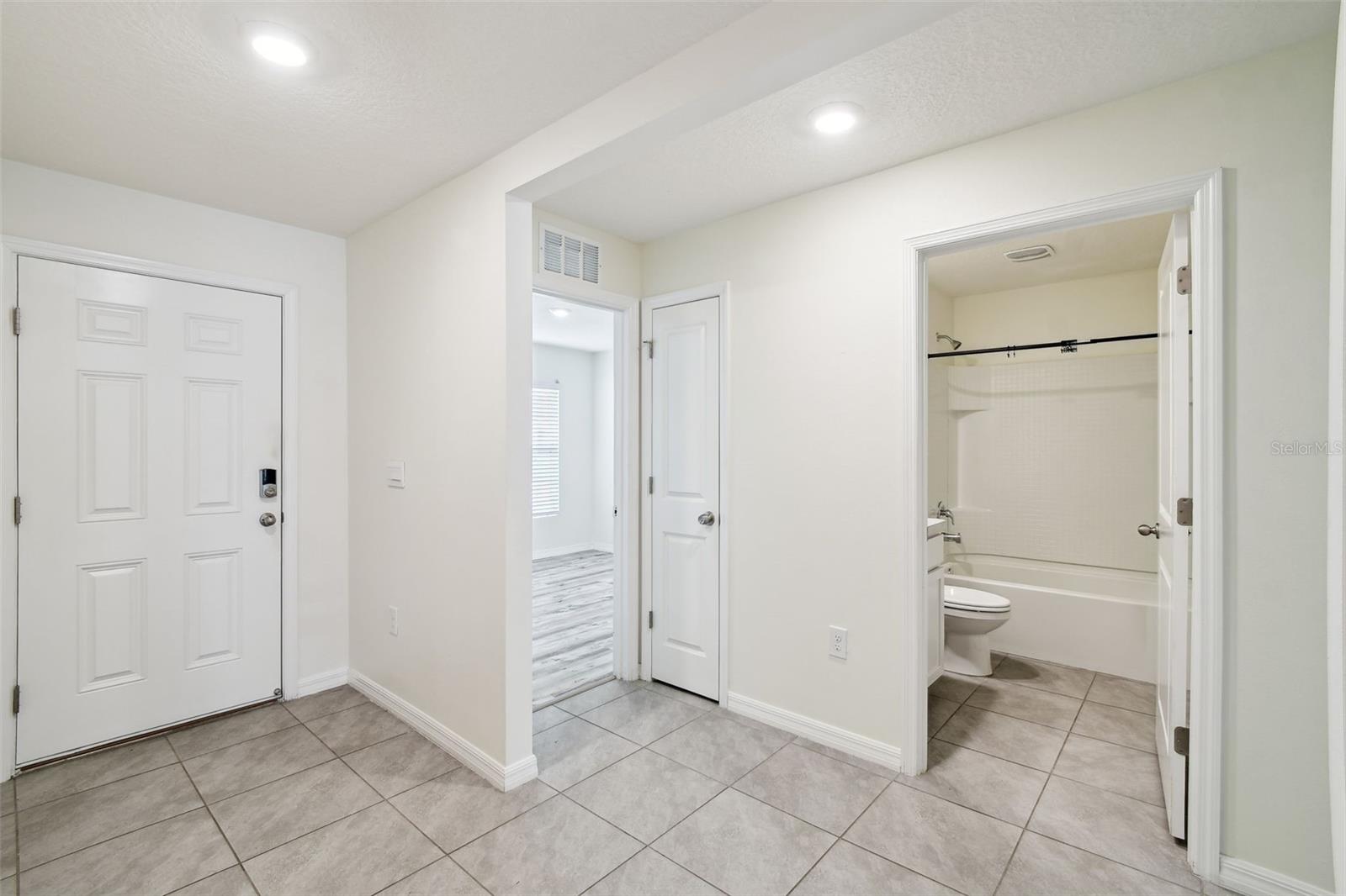 2nd and 3rd bedrooms are at the front with hall bath between.