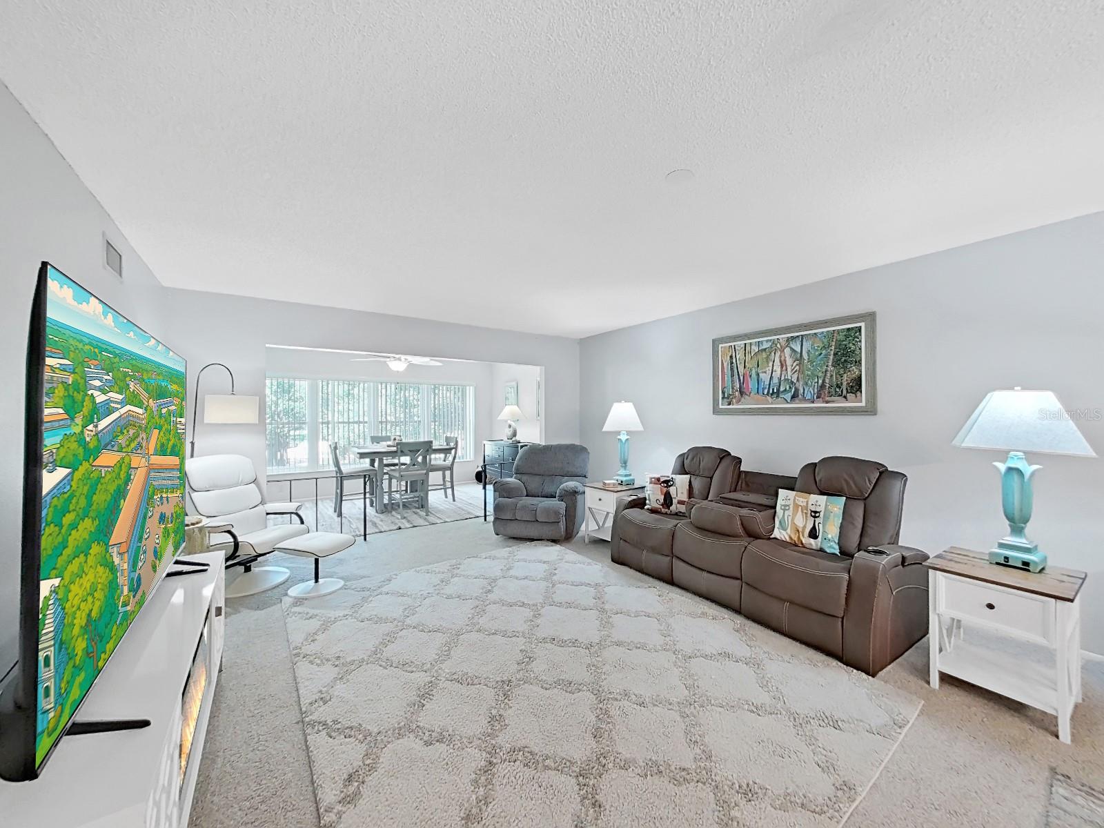 Spacious Living Room can fit overstuffed stuff.