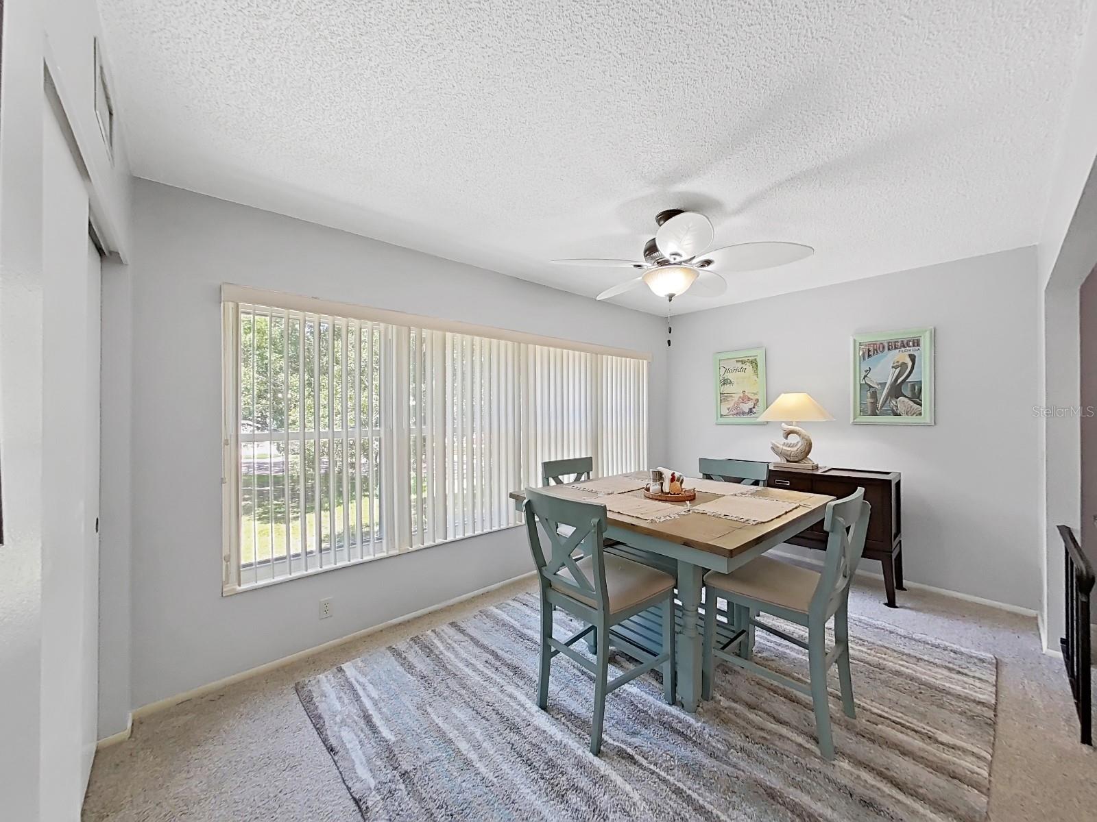 Formal dining takes in view of trees.