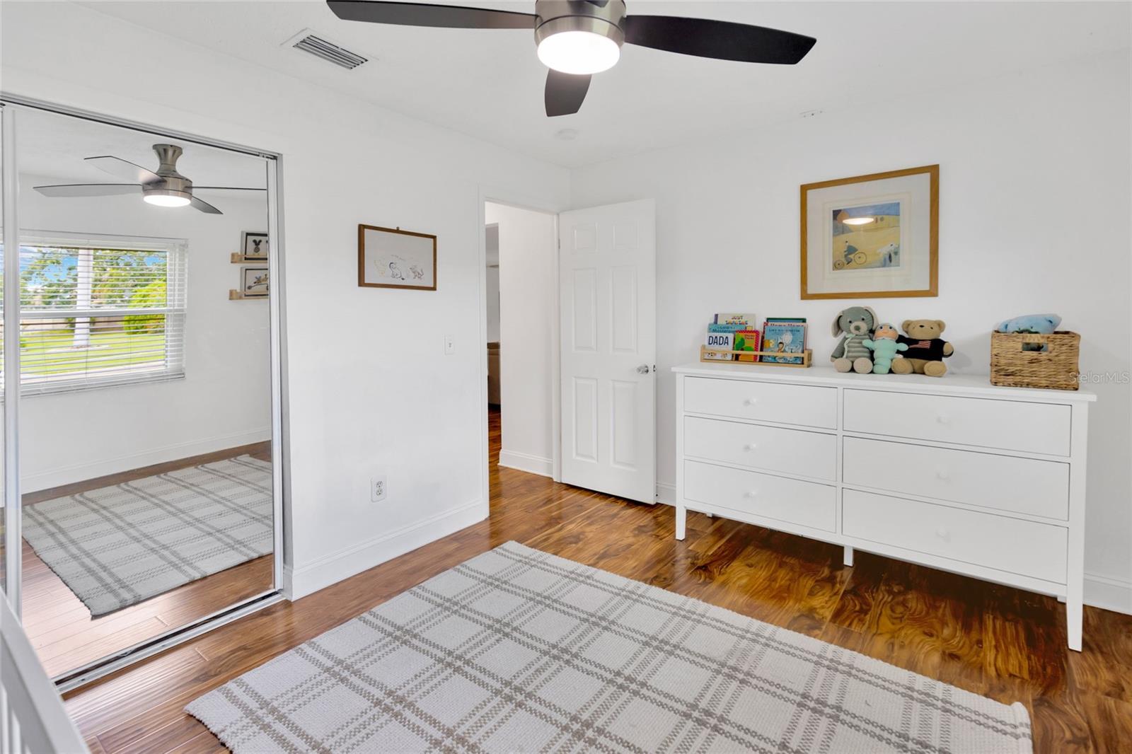 Spacious mirrored closets!