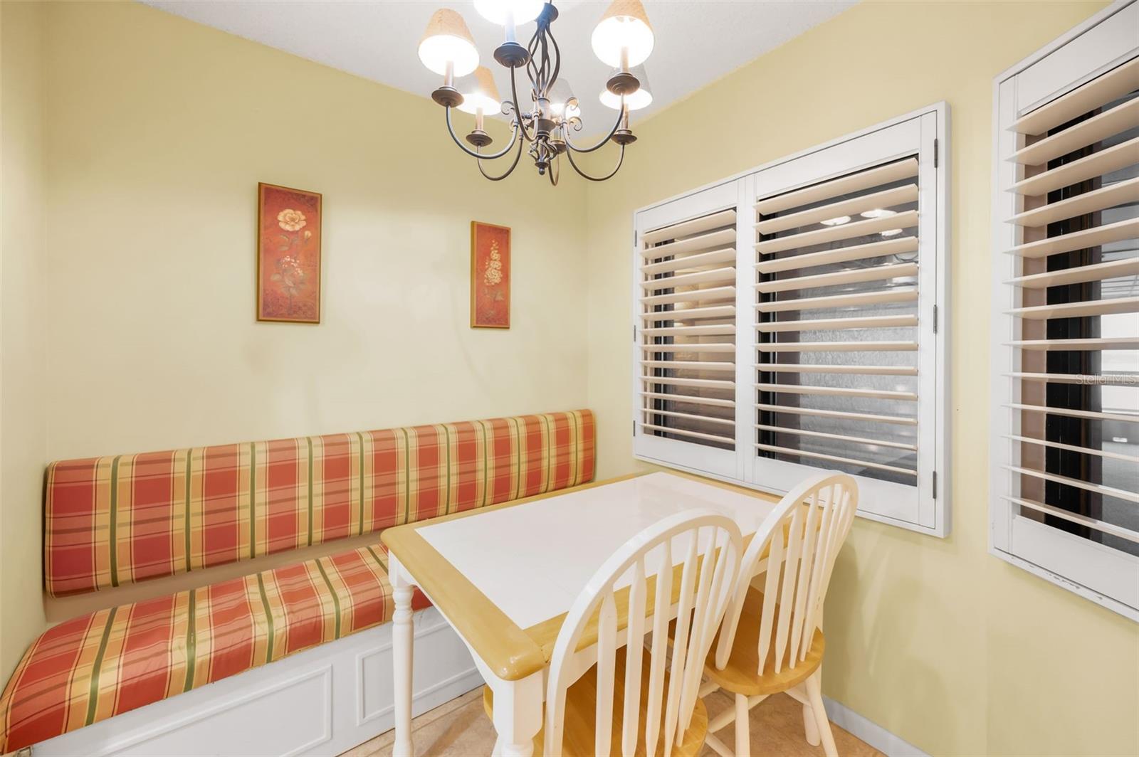 Quaint built-in Dining Nook off the kitchen with a Bay window