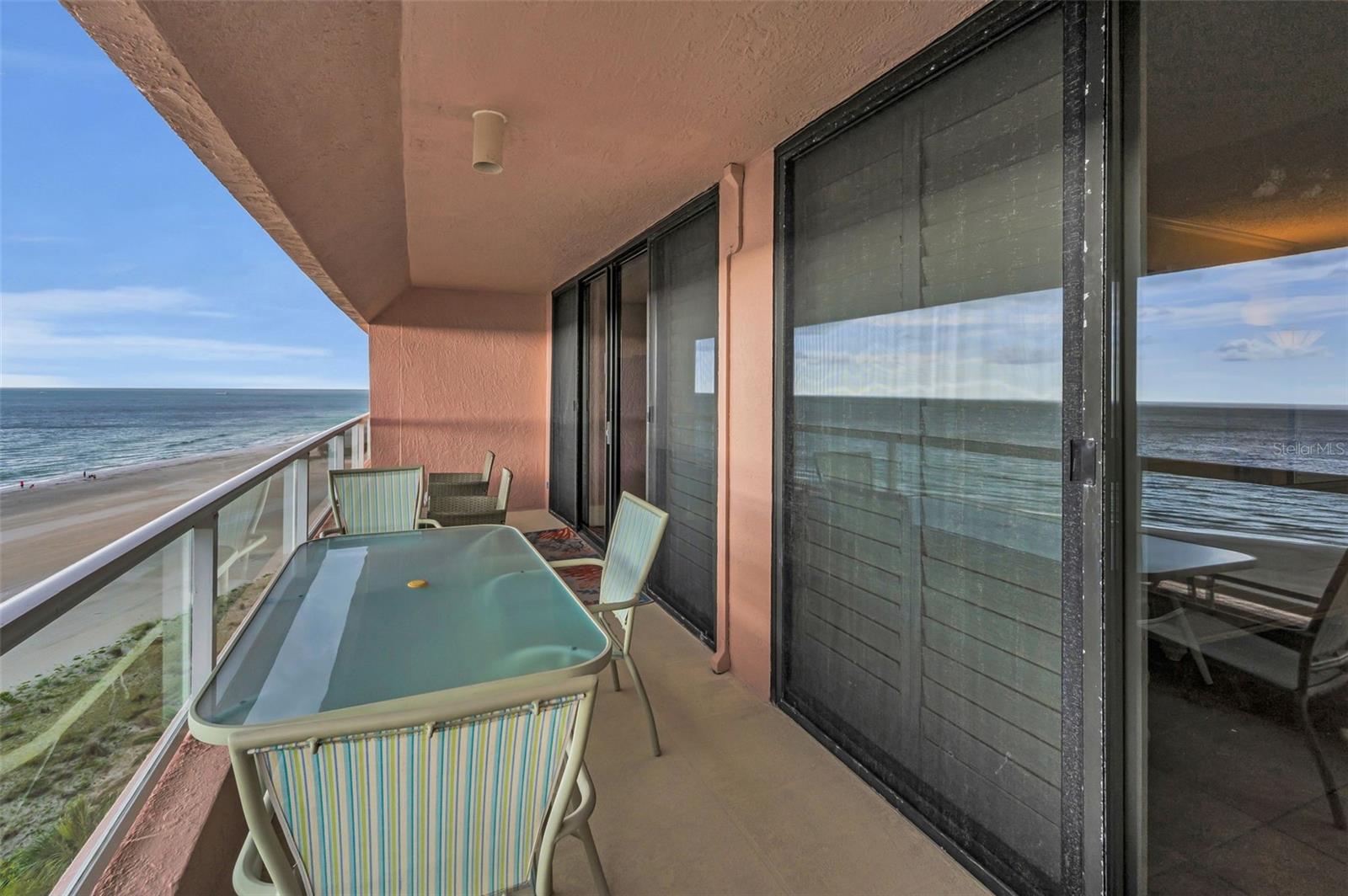 Step out of your Primary Bedroom to the Large Beachfront Balcony