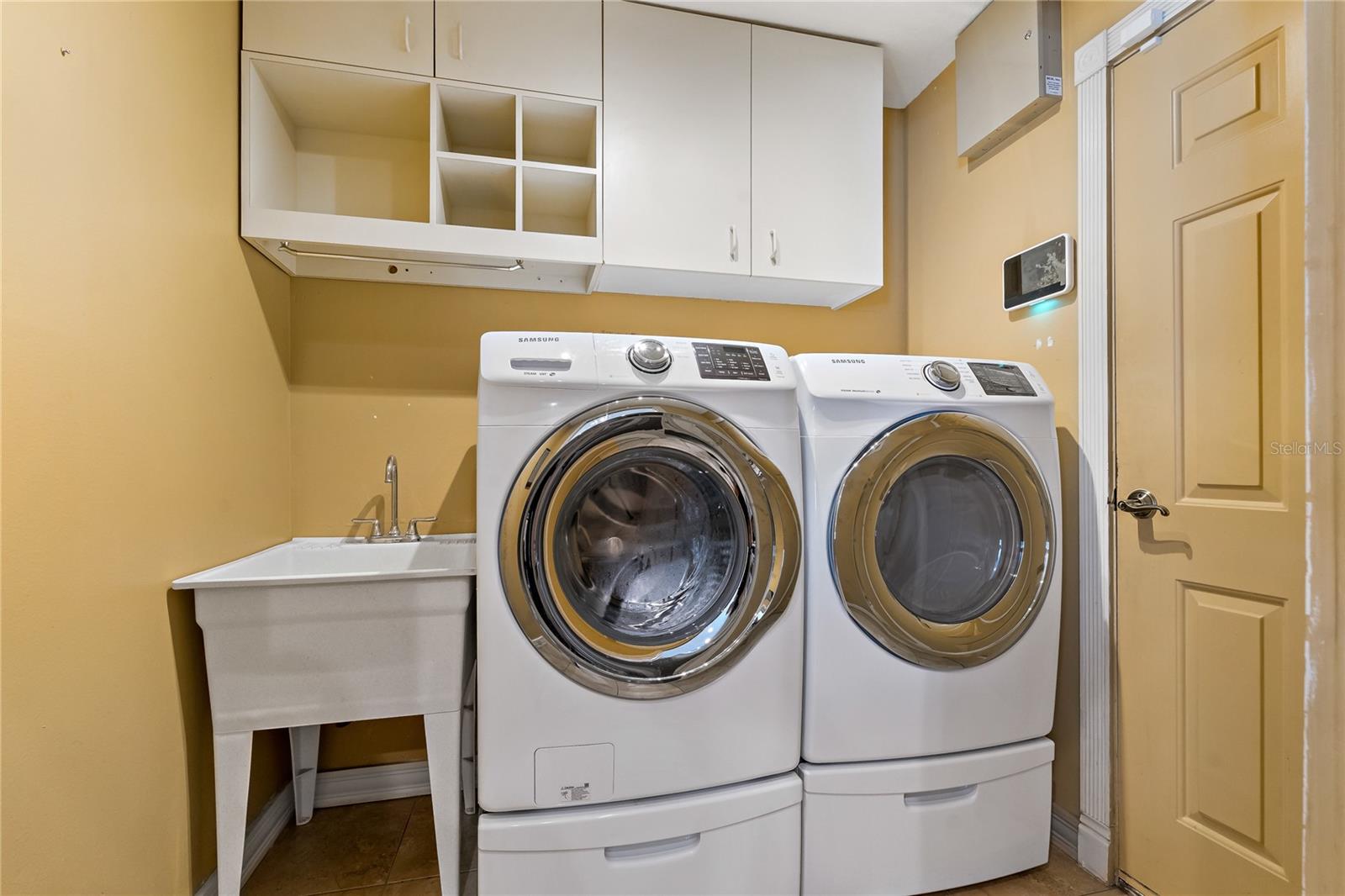 LAUNDRY ROOM WITH UTILITY SINK!