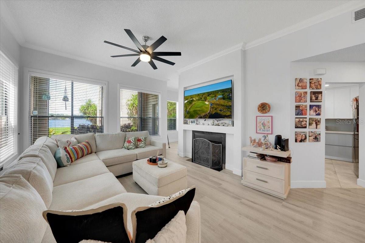 HUGE Living Room through the front door entrance. Windows overlook the Lake!