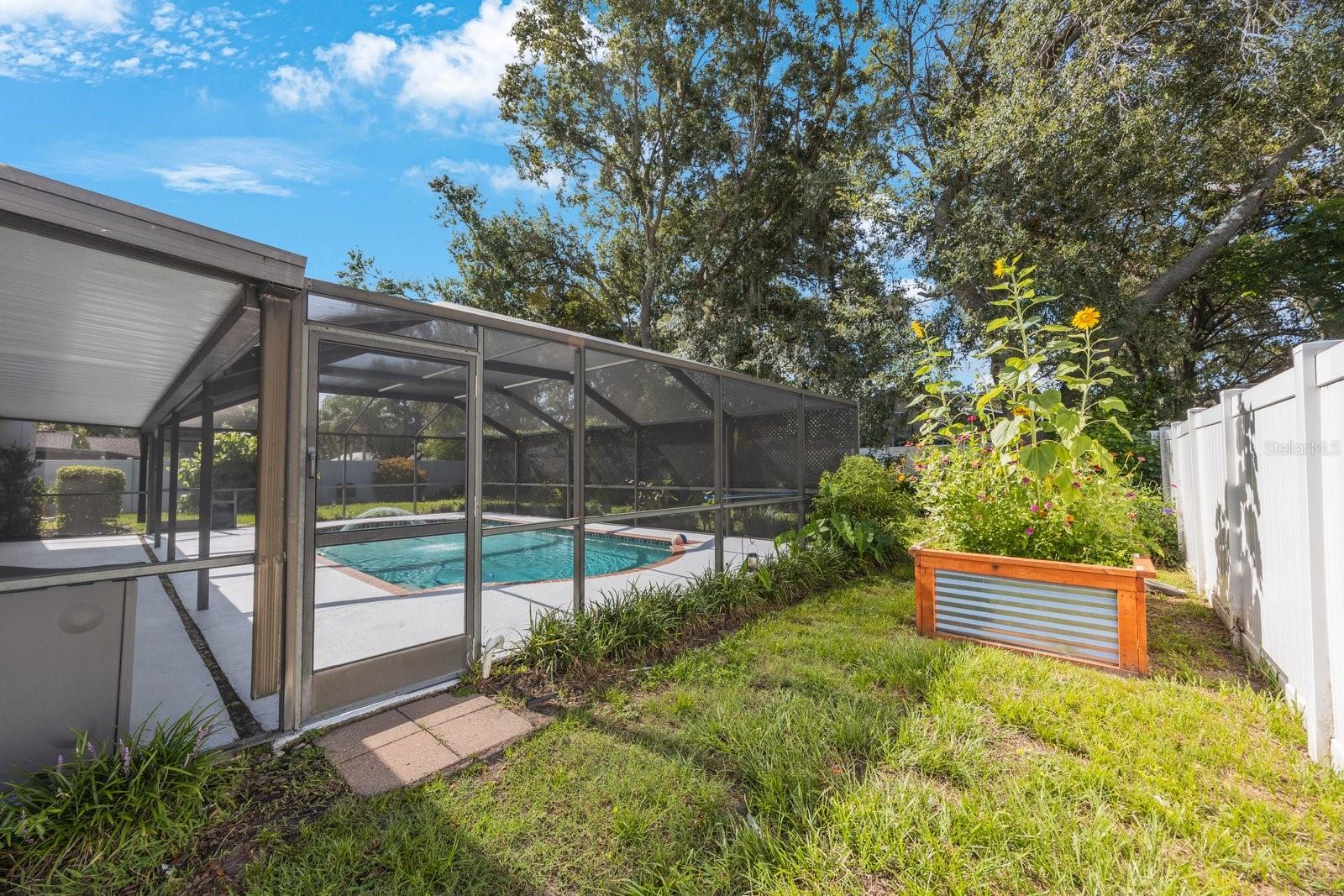 Rear Exterior W/Butterfly Garden