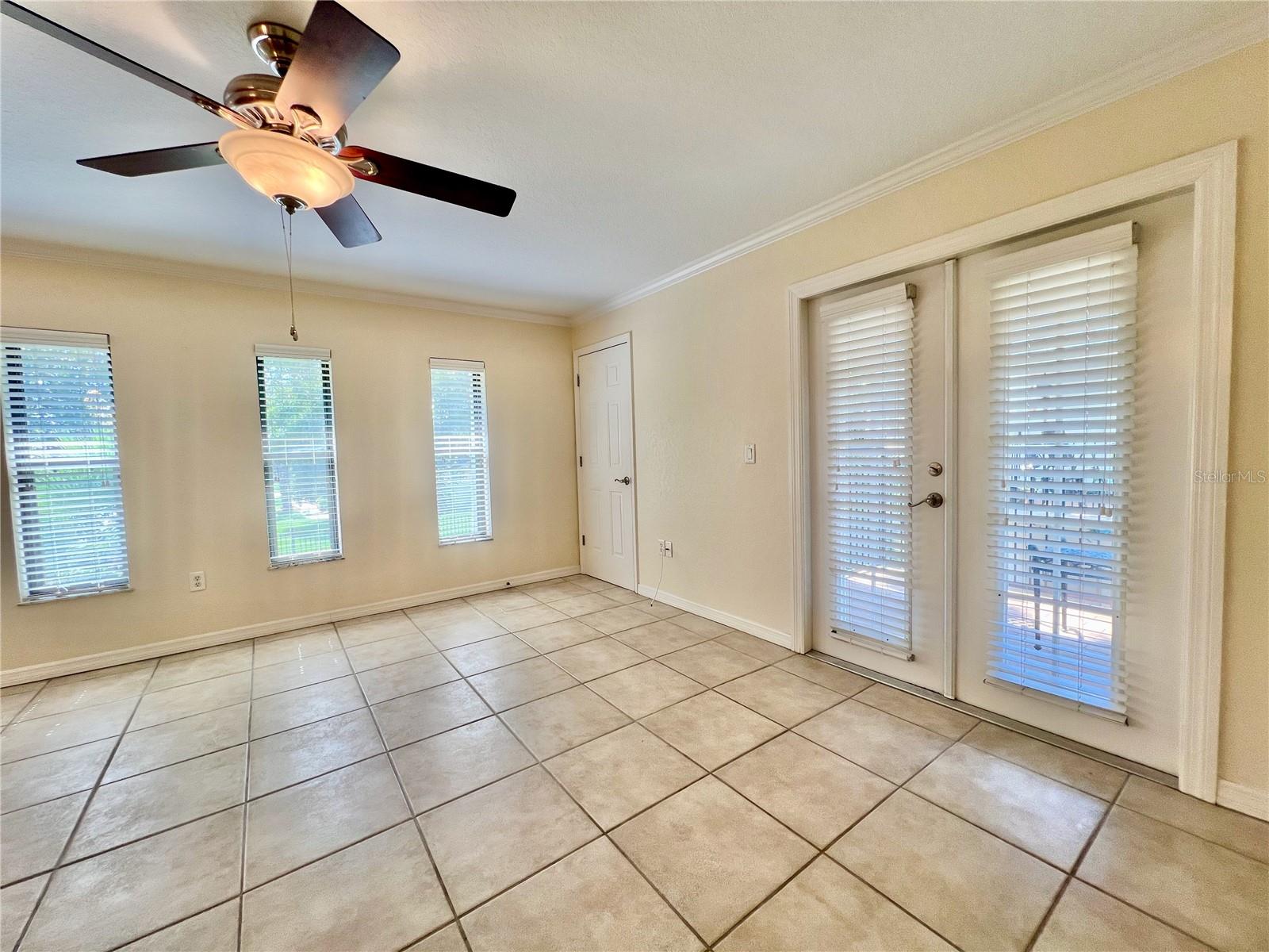 French doors open to lovely porch area