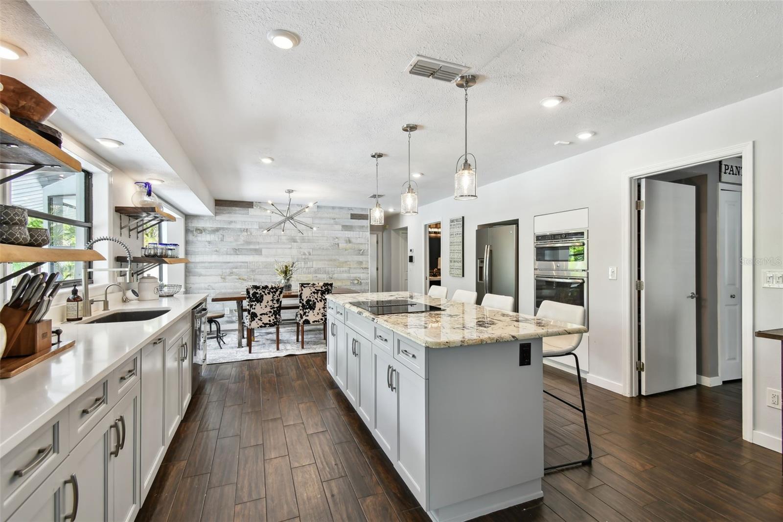 Plenty of cabinets and counter tops.