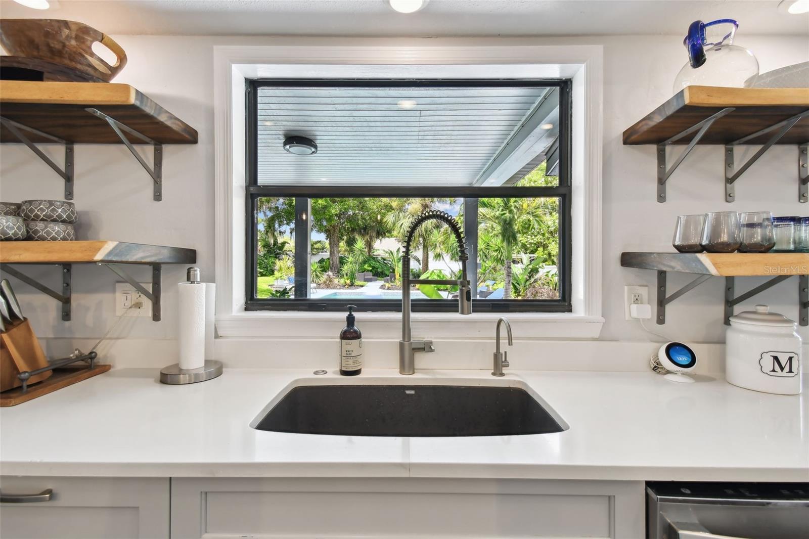 Overlook your tropical paradise when doing dishes. It doesn't get any better than this!