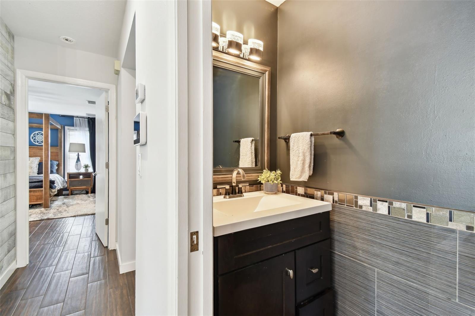 Convenient half bath downstairs.
