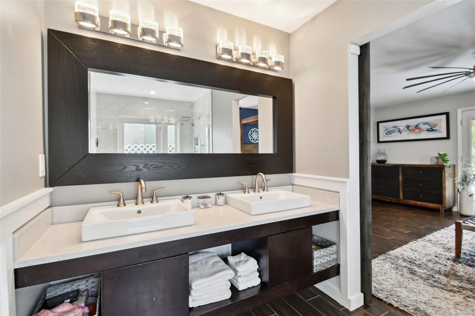 Elegant double-sink vanity in primary bath.