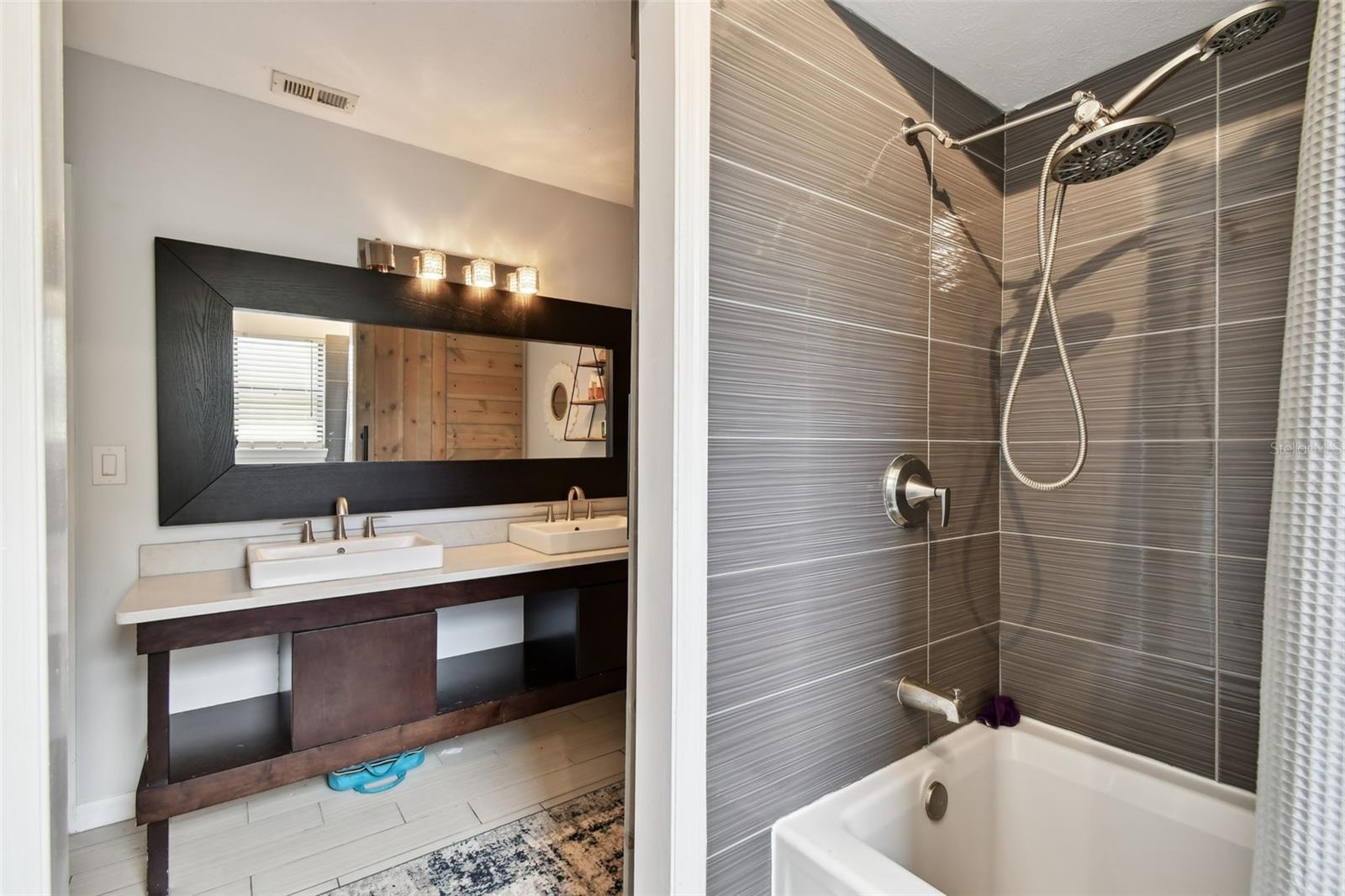 Shared full bath for the secondary bedrooms.