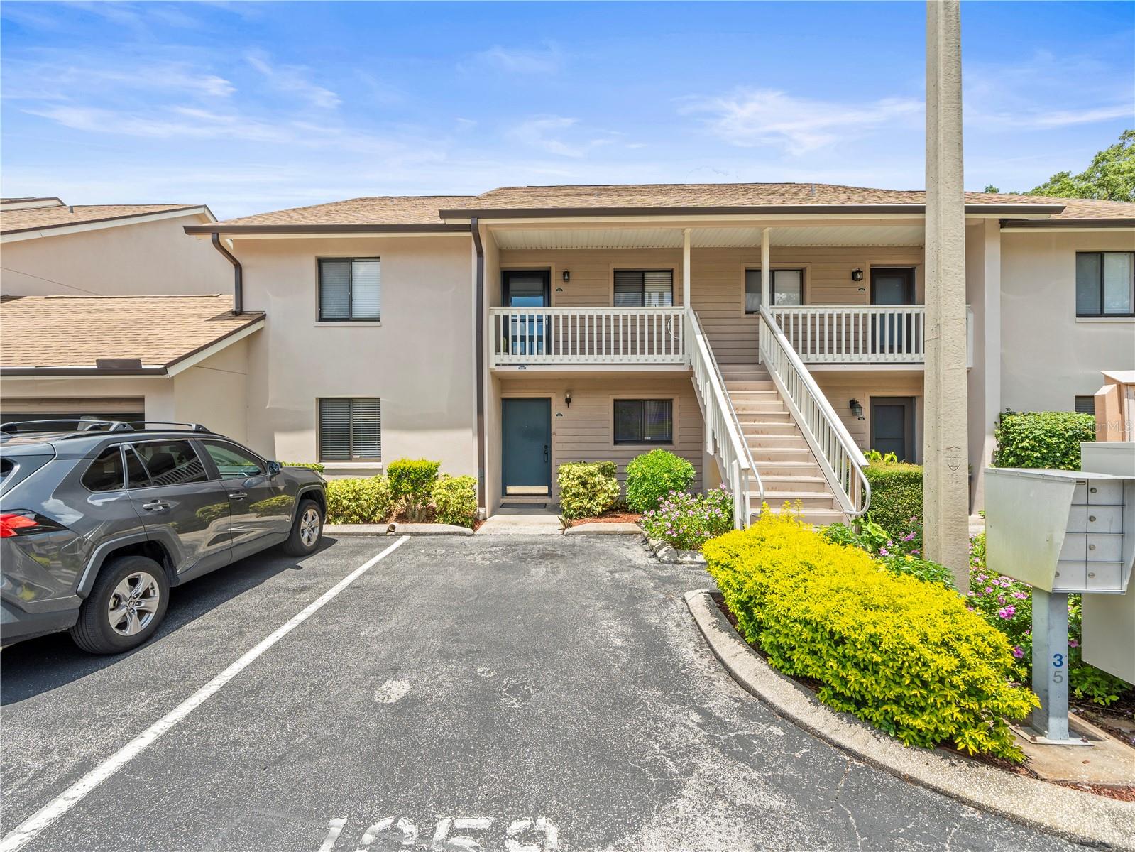 Front exterior and parking space