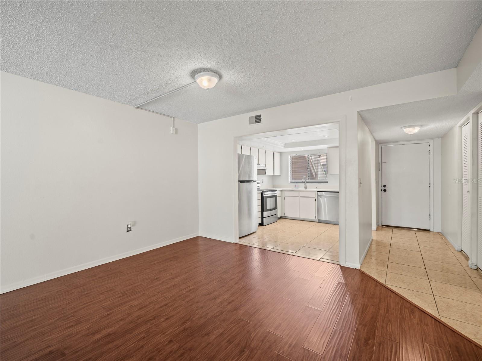 Kitchen  and entry hall way view from Great Room