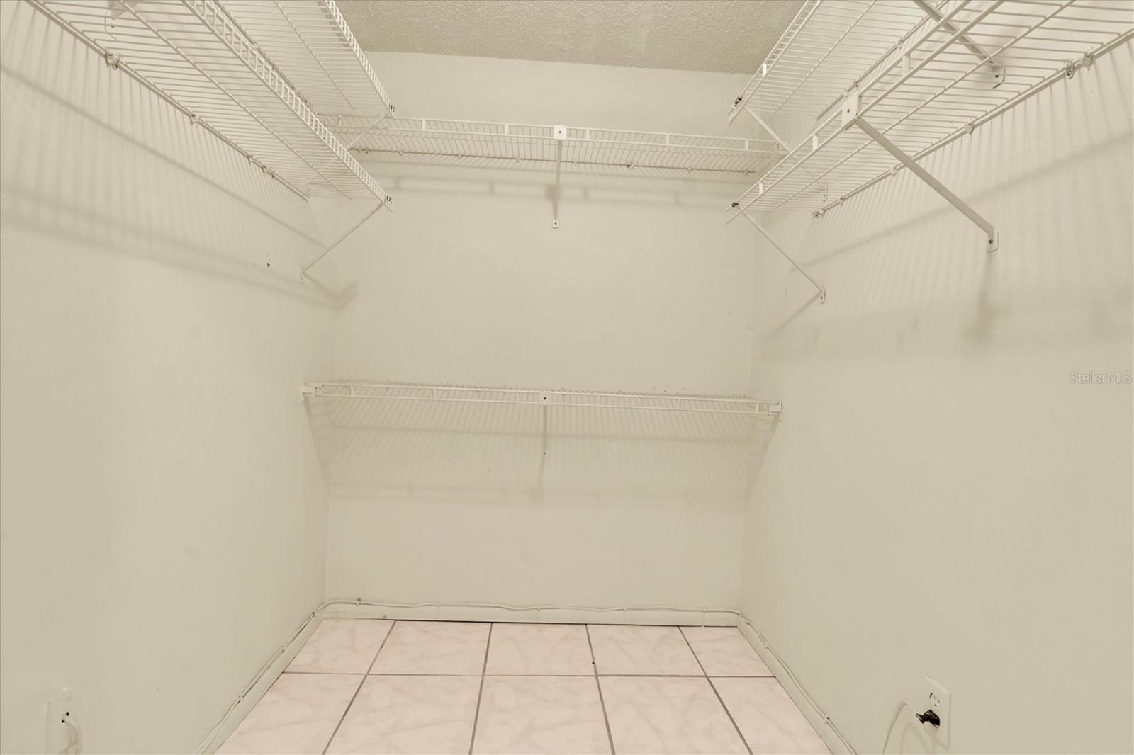 Walk-in closet in the primary bedroom