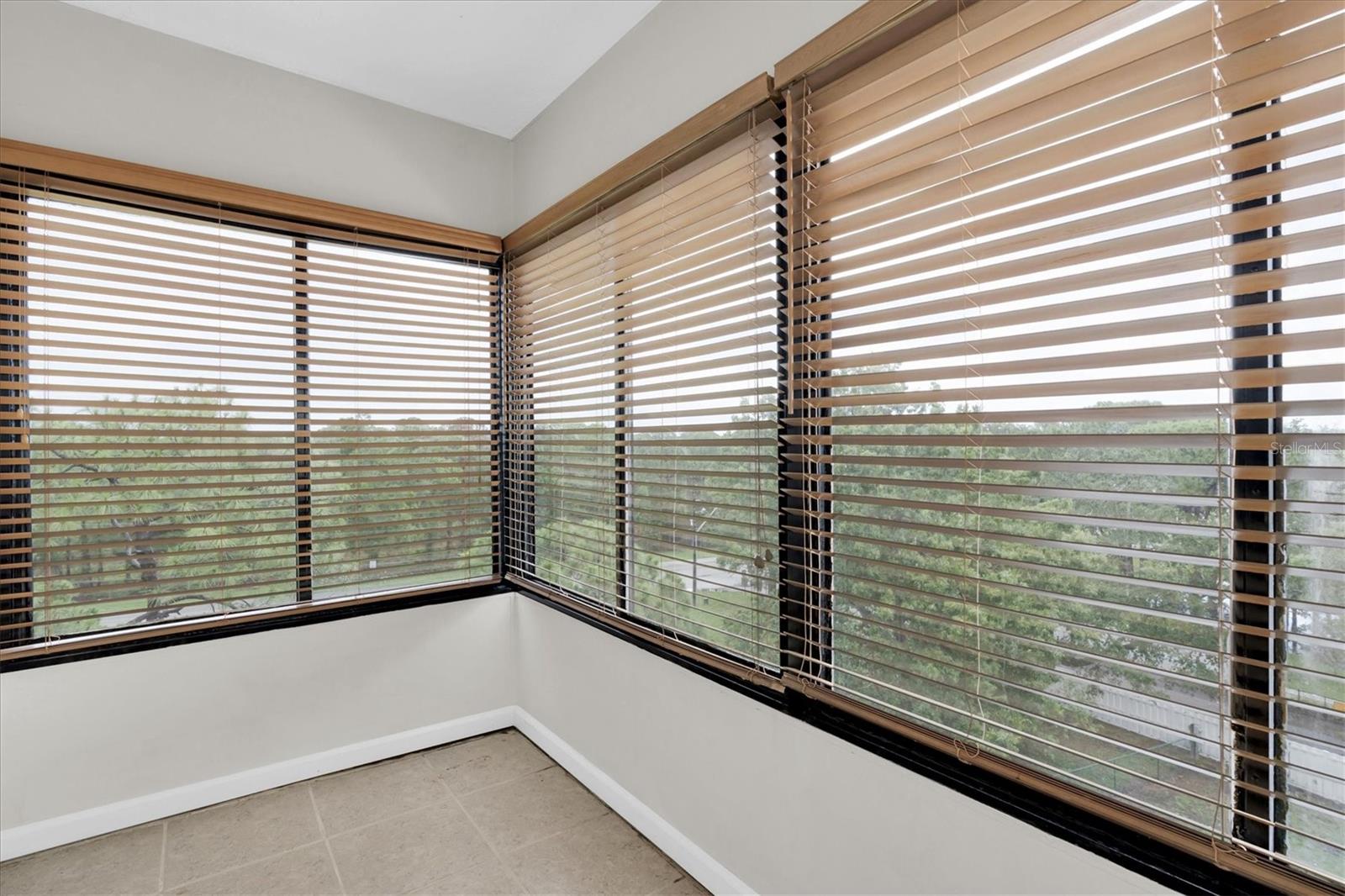 Enclosed patio off of the primary bedroom