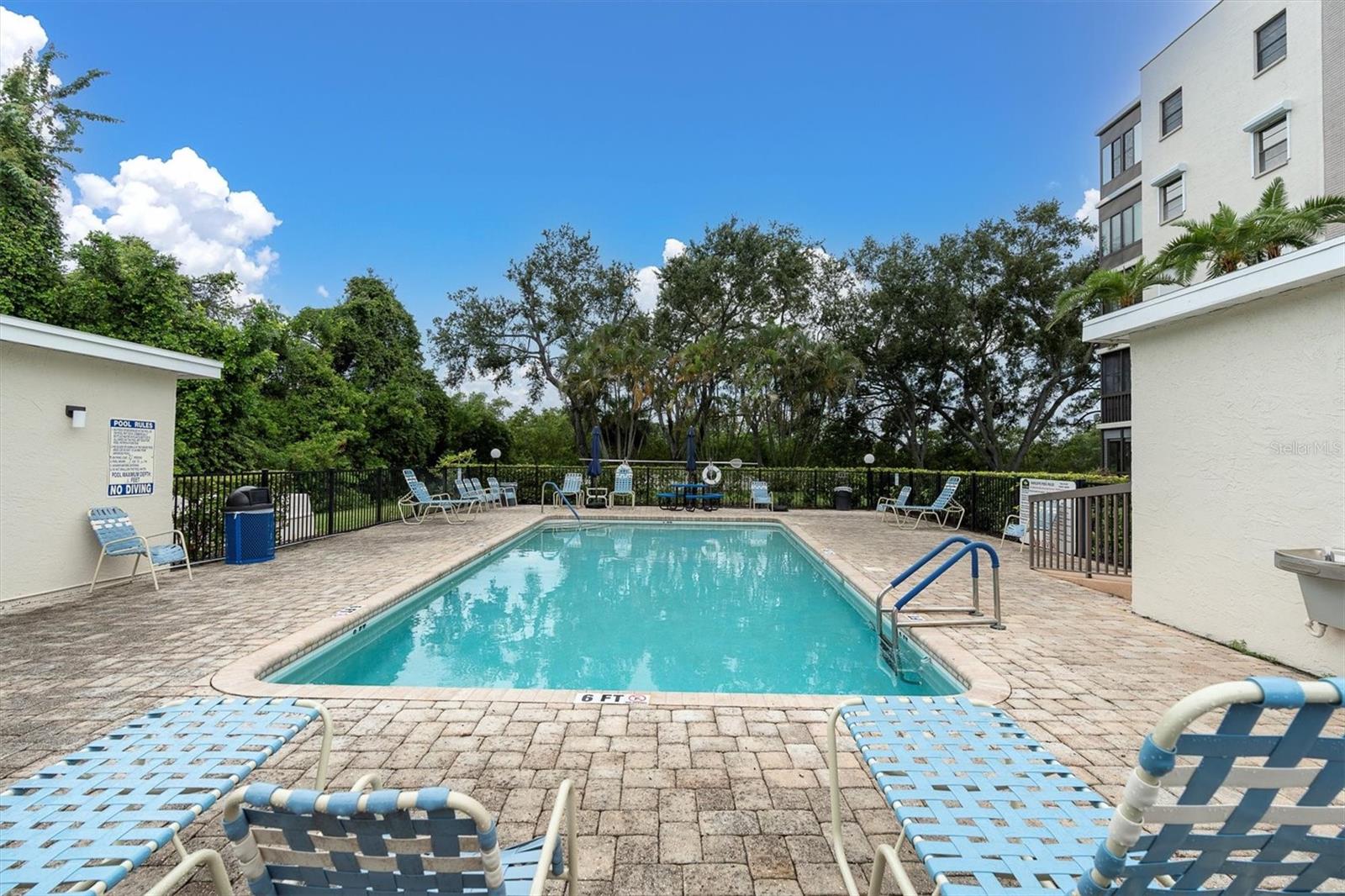 Resident pool located directly next to the building