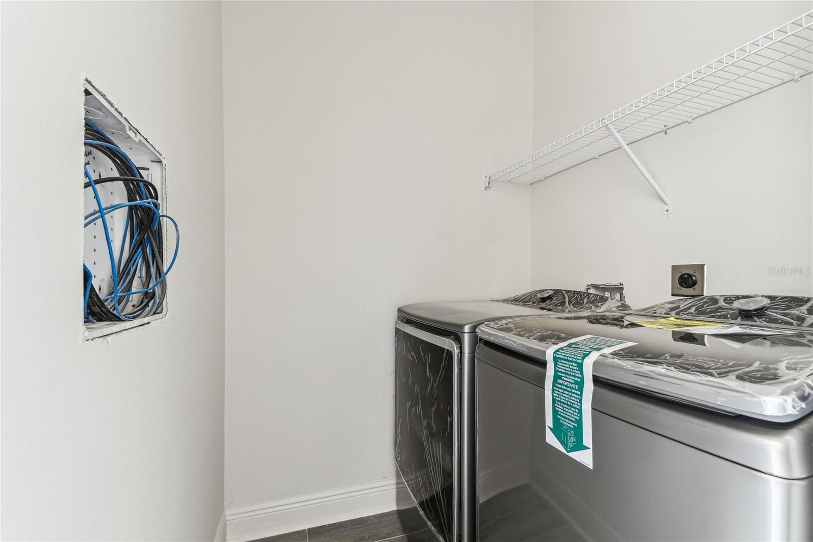 Laundry room with New Washer and Dryer