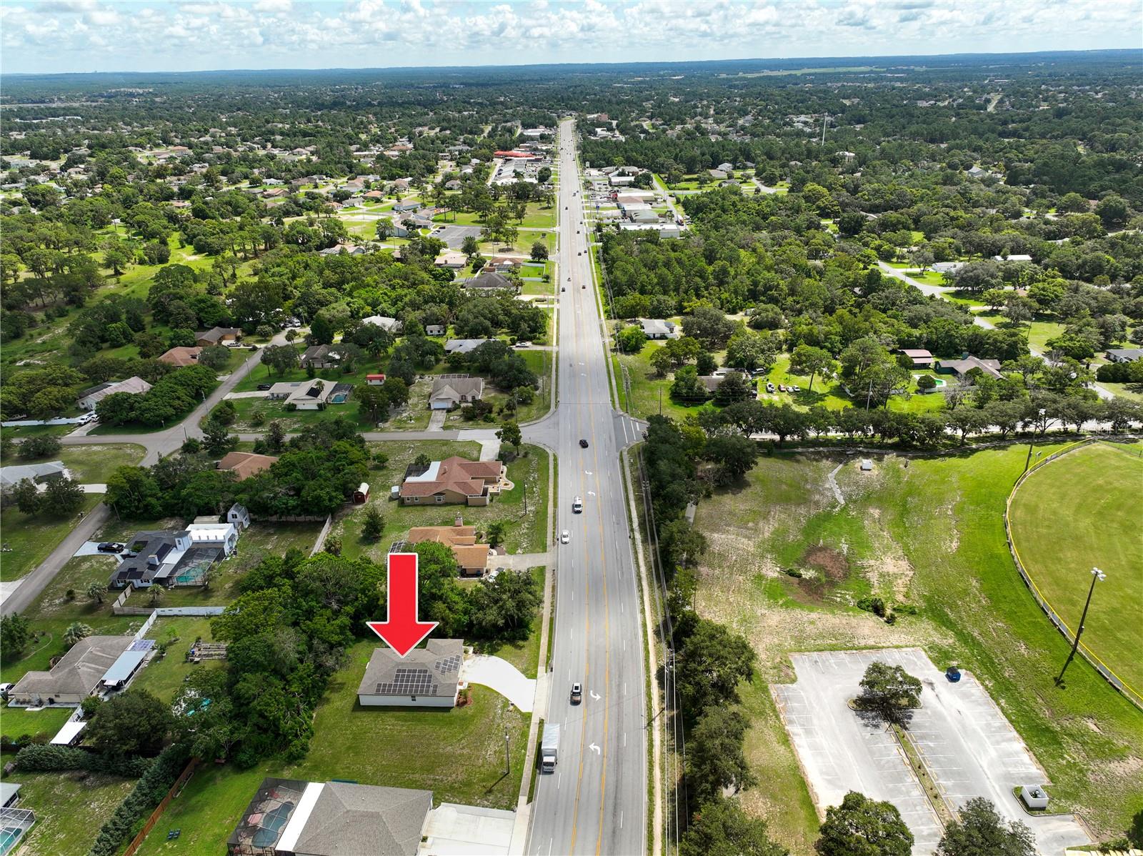 Aerial Overview of Home and Solar Panels