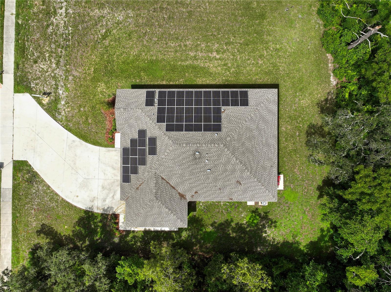 Aerial Home and Solar Panel Photo