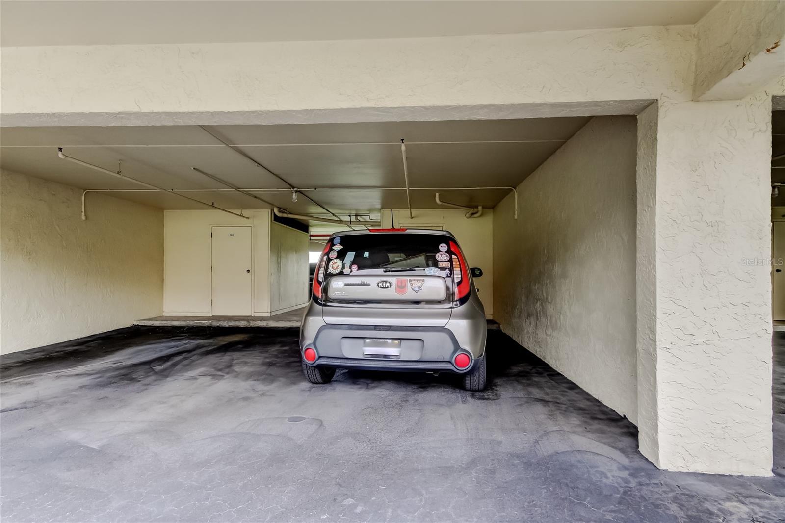 Under building parking spot along with a storage unit