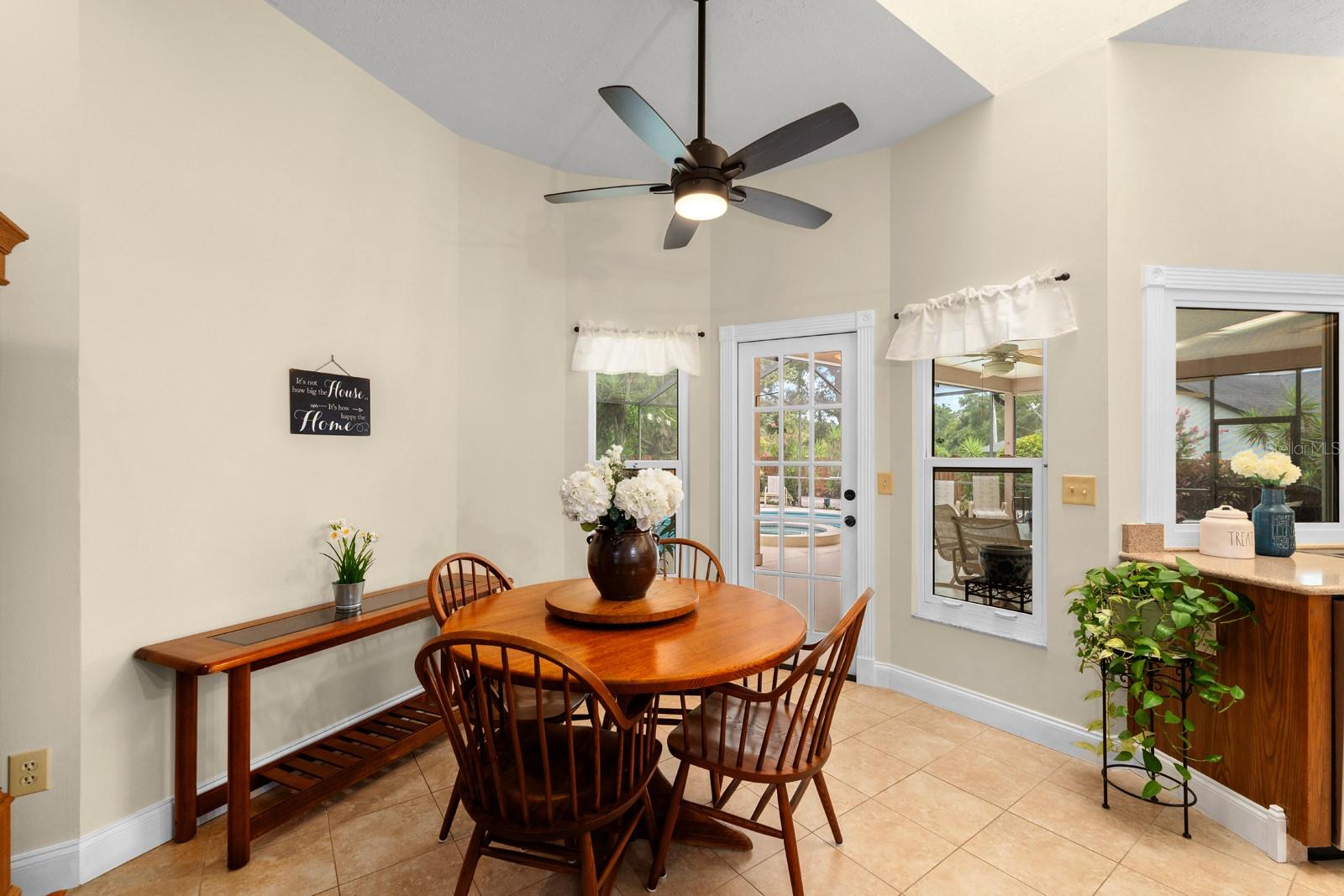 A spacious dining area next to the kitchen is a great gathering space when you're entertaining.