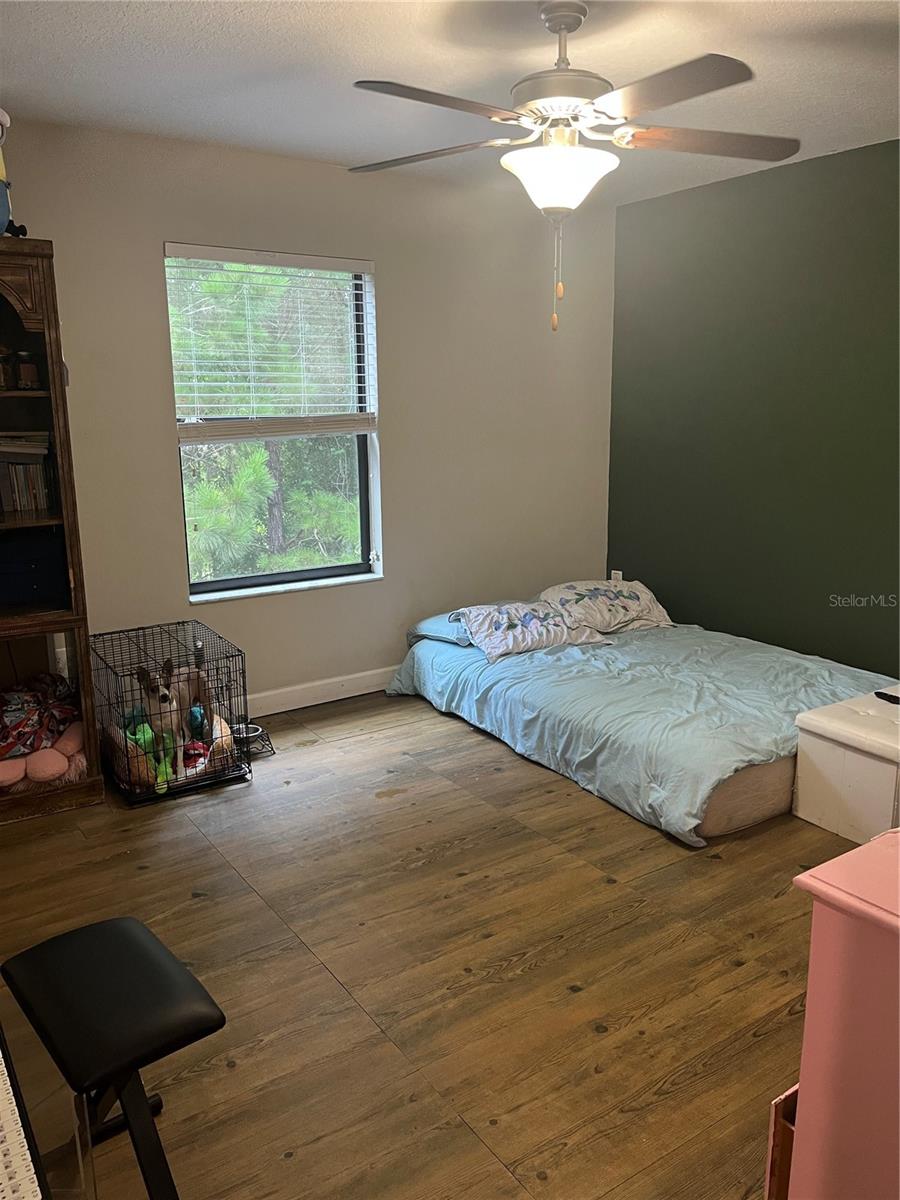 Upstairs bedroom vinyl plank floor