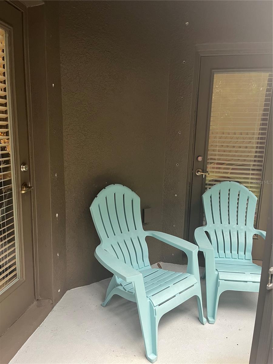 Walk out to back porch from living room and primary