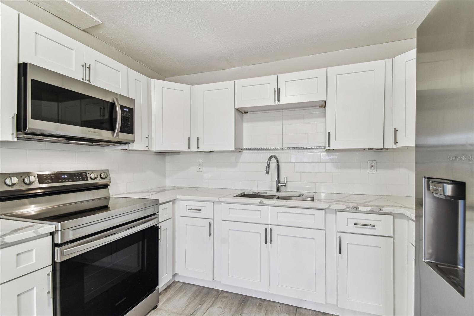 Stainless Steel Range w/ overhead Microwave