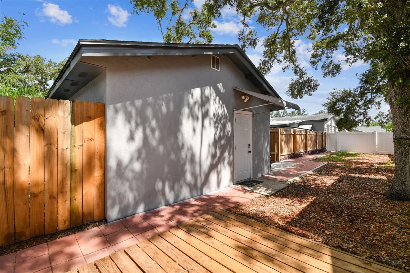 Private entrance and double gate to at the Guest Cottage