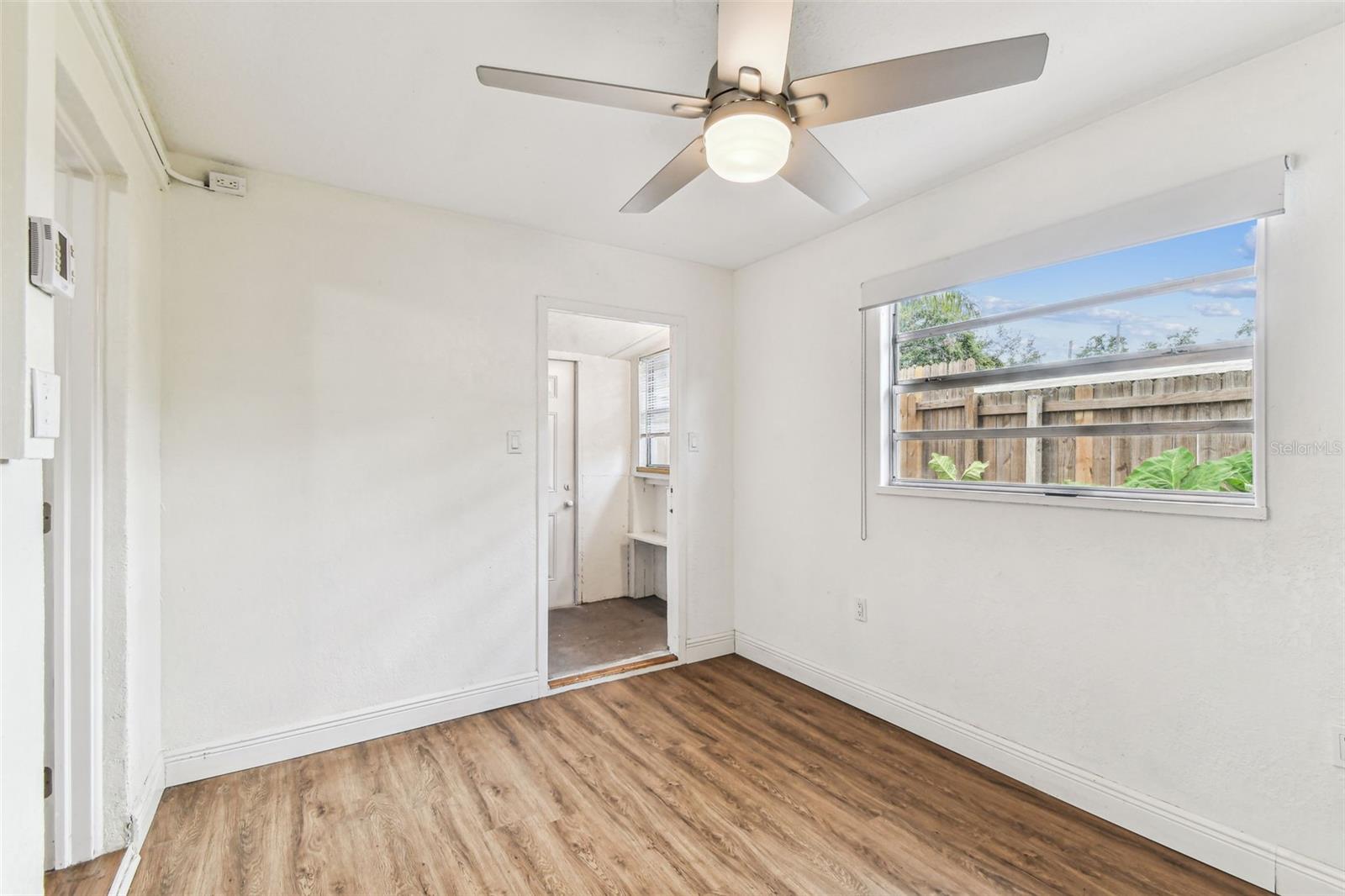 Living room overlooking the laundry room & back entrance