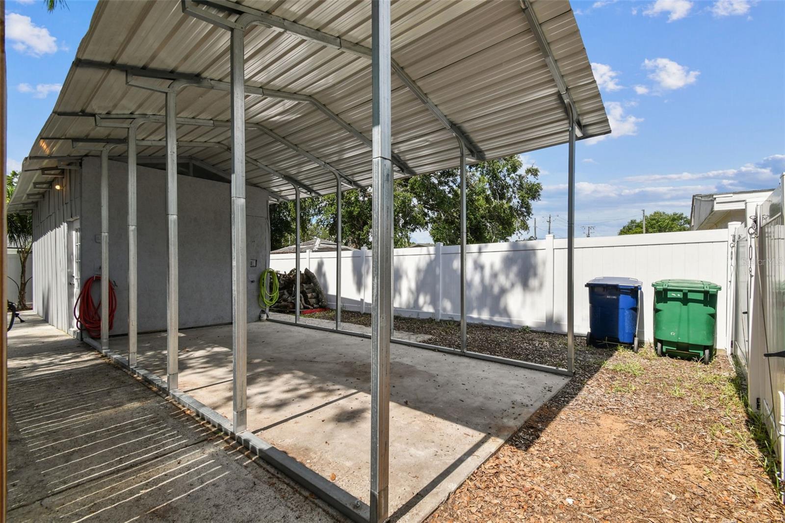 RV Carport with full connection (water, sewage & 30/50 amp)