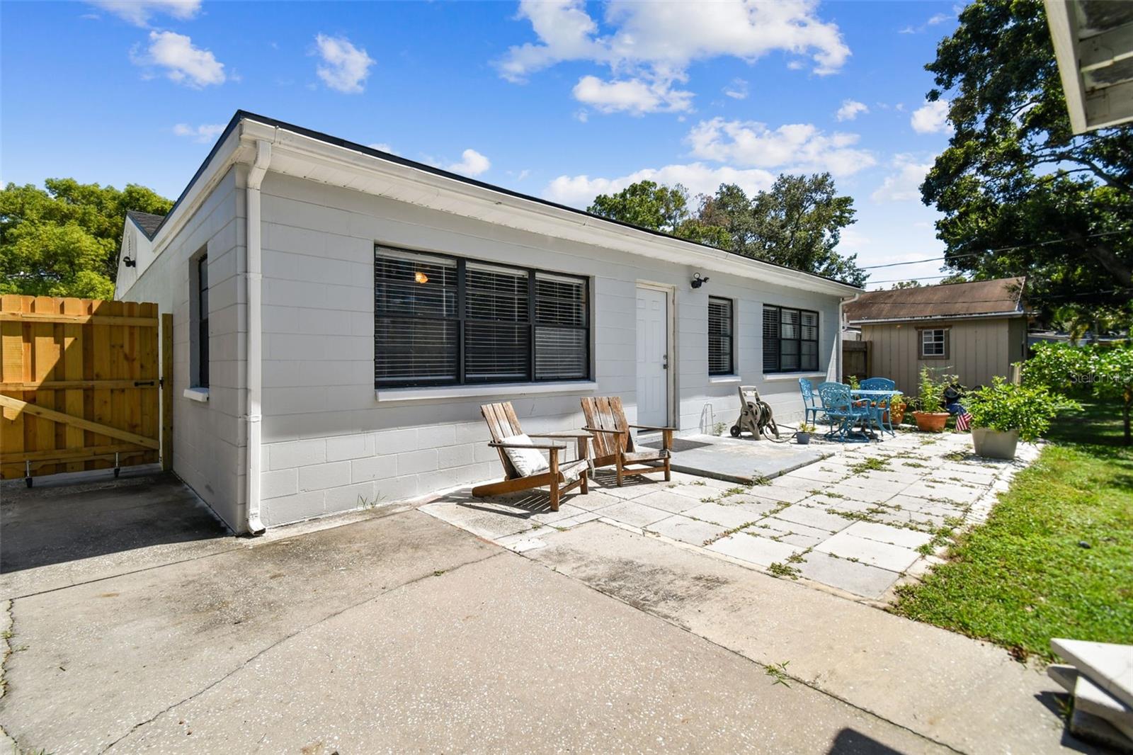 Back of the home and separate entrance to the back unit