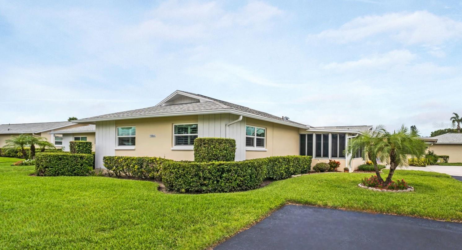 Welcome home! Large corner lot with driveway to attached garage plus additional parking in front~
