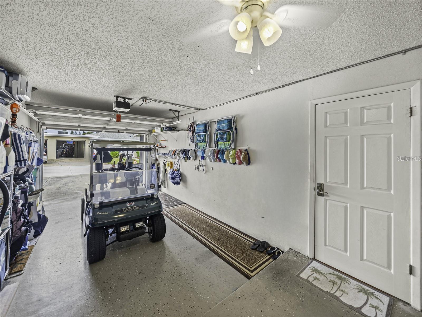 Spacious attached garage big enough for both your car & golf cart too~