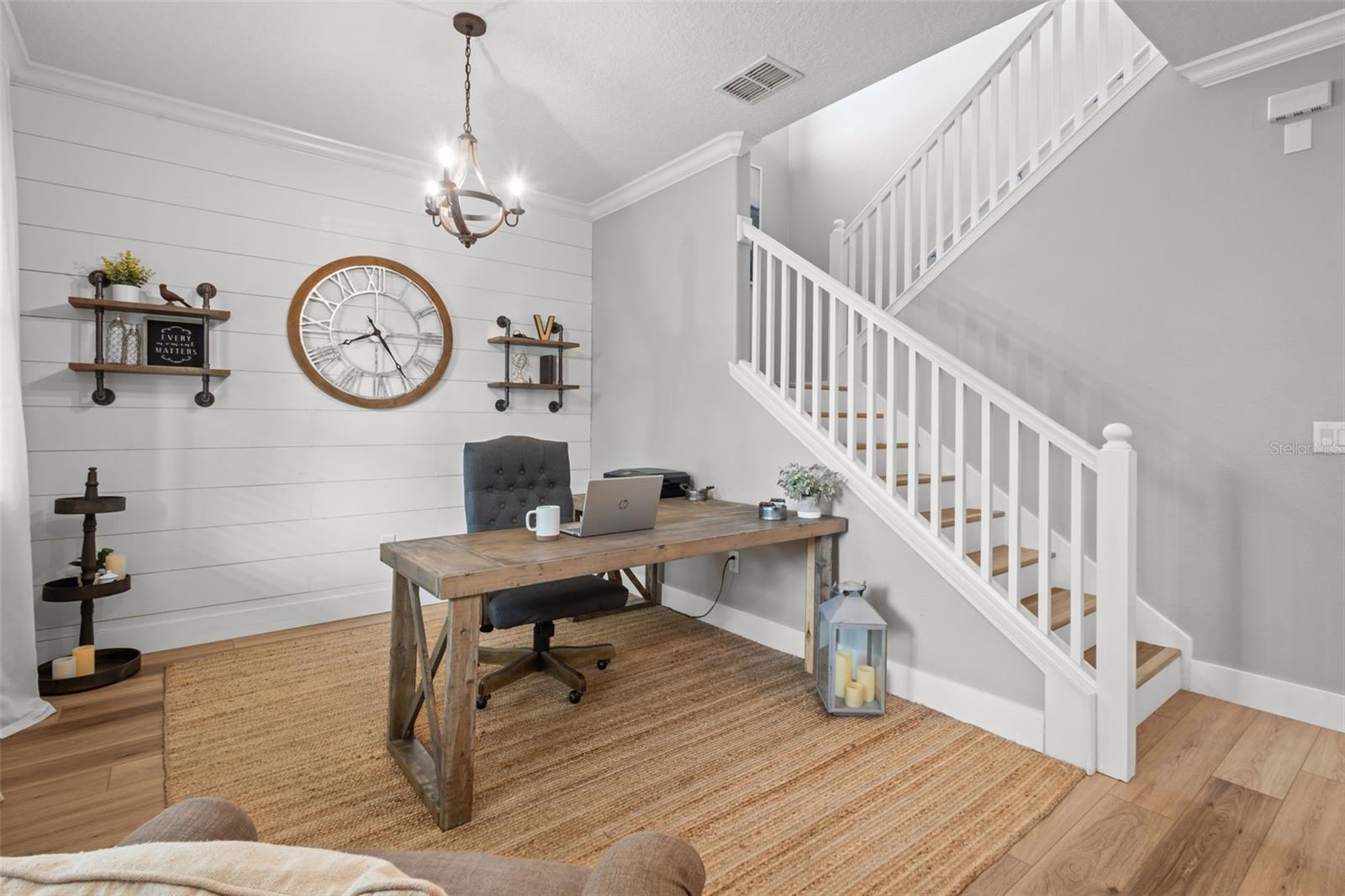 Flex Area in front being used as an office with shiplap