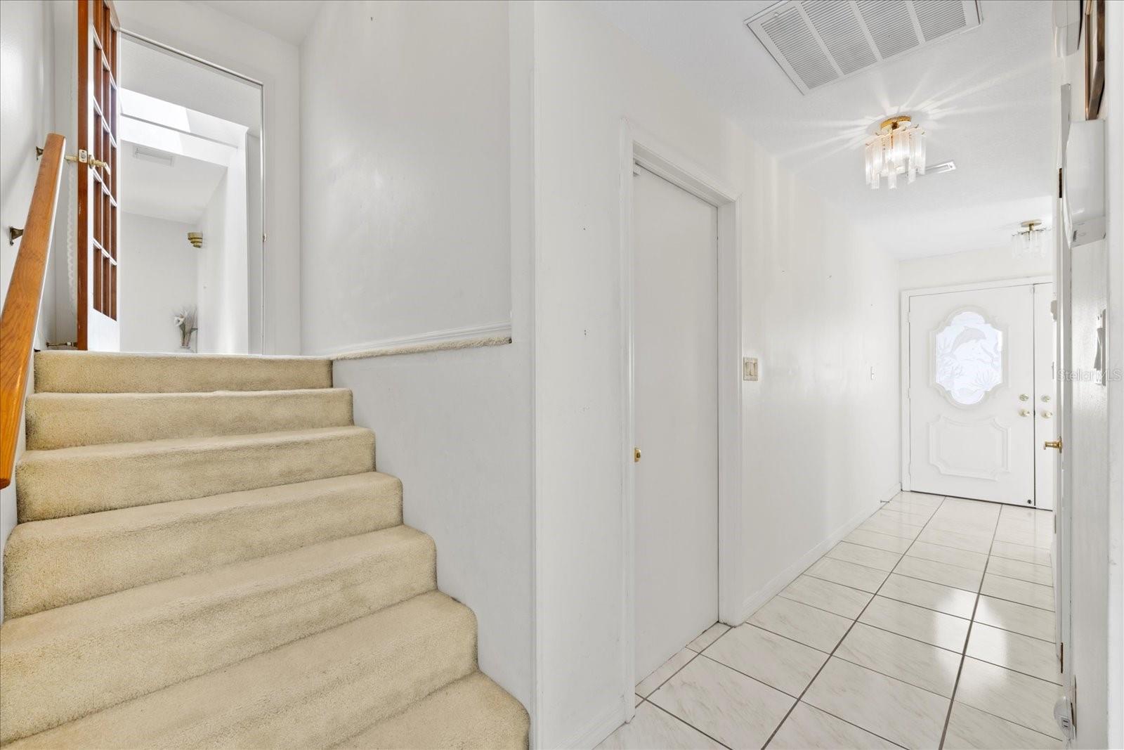 Exit to pool area from upper living area